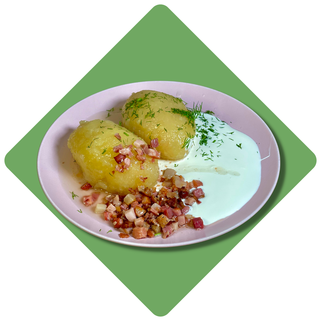 Tarkuotų bulvių cepelinai su kiaulienos mėsa